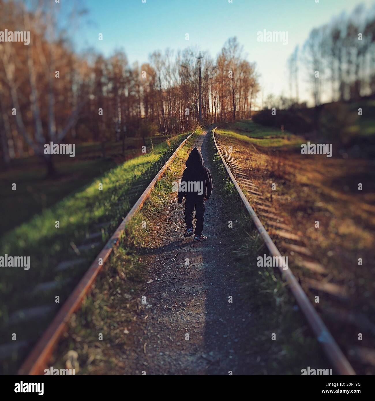 Leaving by rail boy Stock Photo Alamy