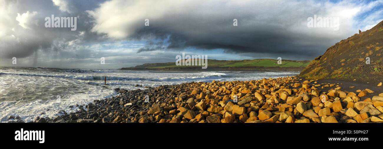 Panoramic view of Kimmeridge Bay Dorset with dramatic stormy Sky and rough sea. - Smartphone Captured Stock Image