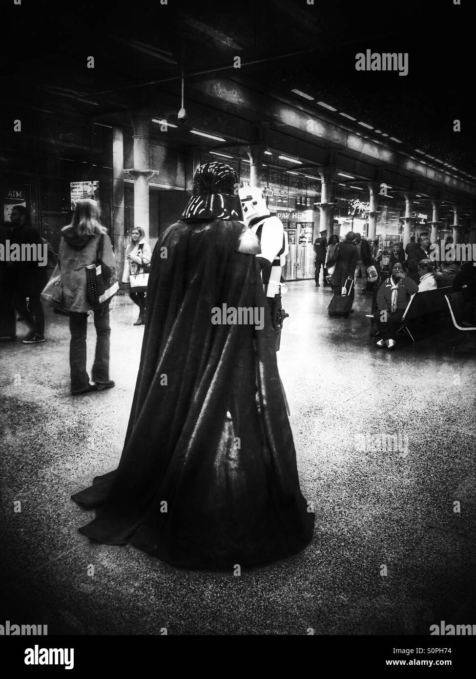 Man dressed up in Star Wars Darth Vader costume, St. Pancras International Station, Central London, England, United Kingdom, Europe Stock Photo