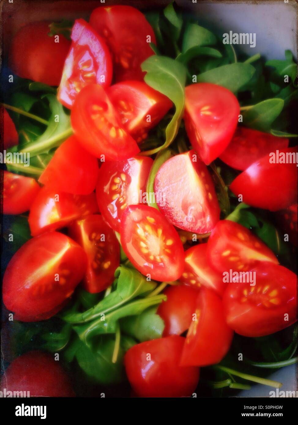 Tomato and rocket salad Stock Photo Alamy