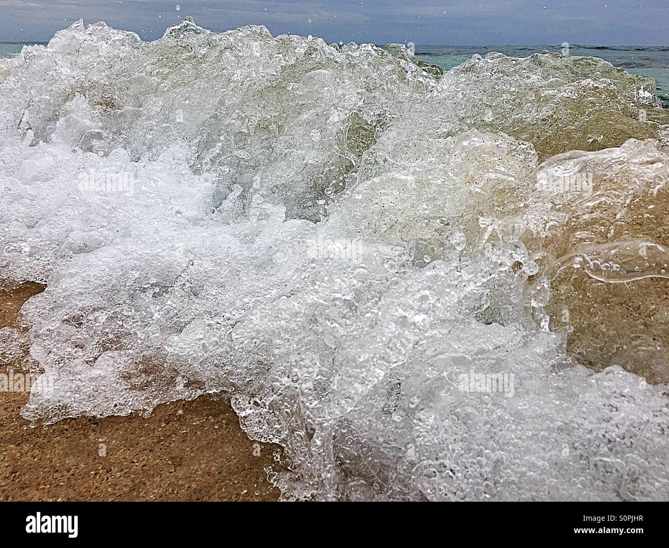 Close-up of foaming wave break - Smartphone Captured Stock Image