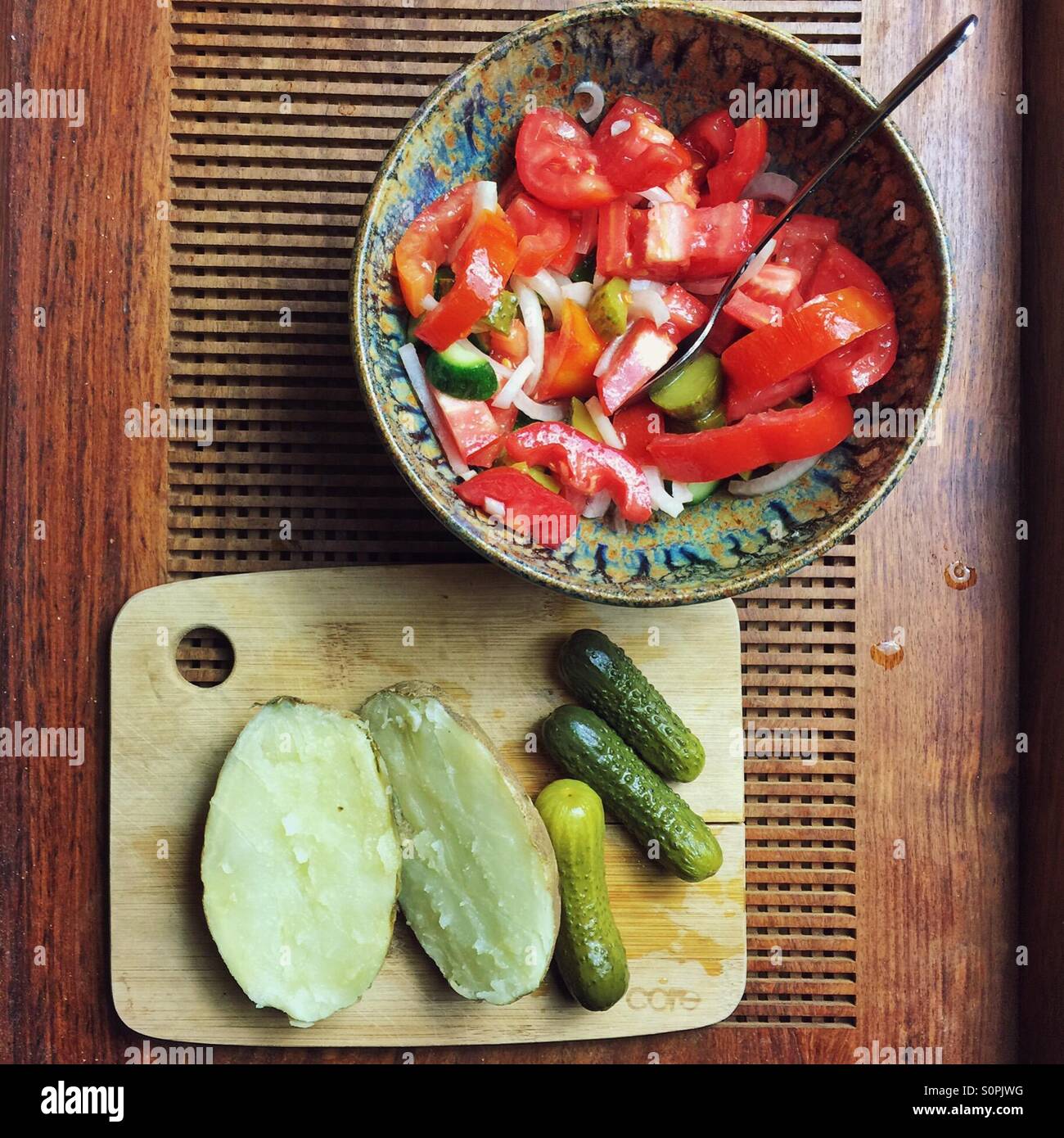 tomatoes and cucumbers salad and potatoes - Smartphone Captured Stock Image