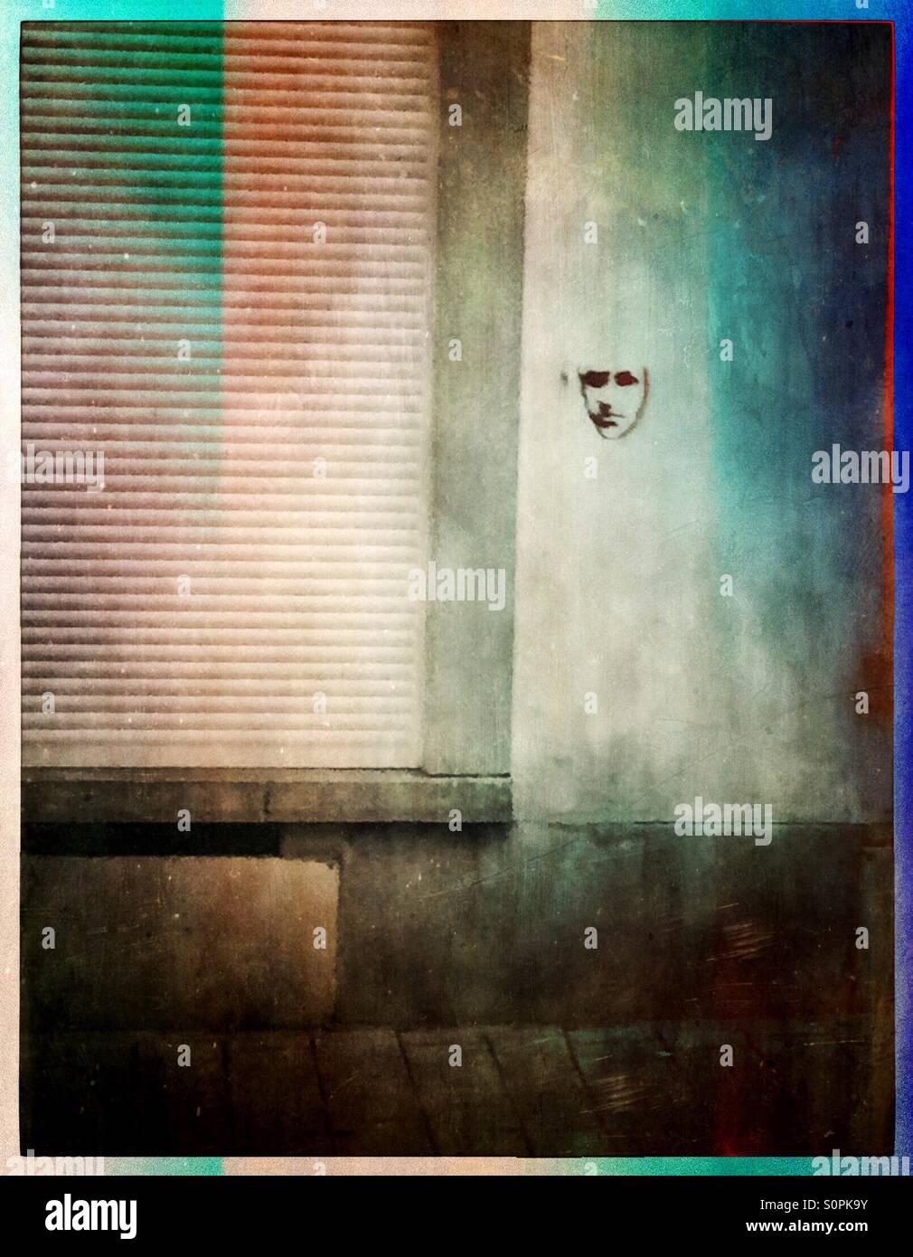 Graffiti face on a wall - Smartphone Captured Stock Image