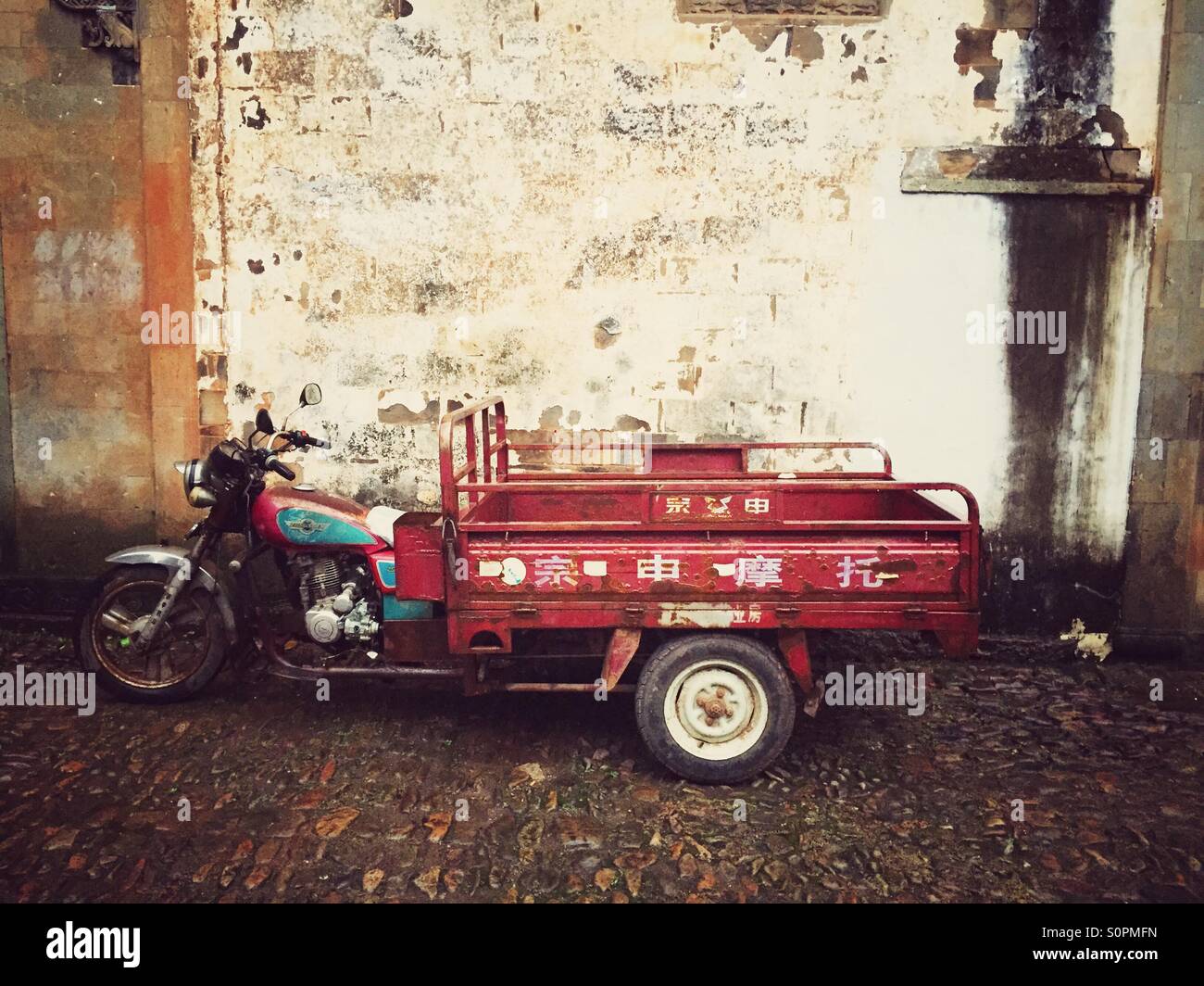 Motorised tricycle in a chinese village Stock Photo Alamy