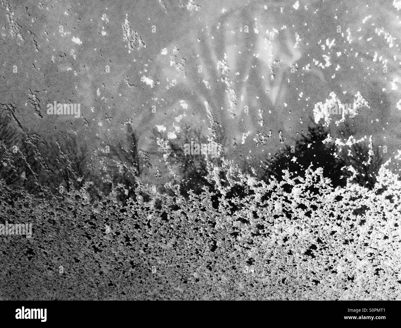 Snow falling on a window in rural Northumberland on Christmas Day. - Smartphone Captured Stock Image