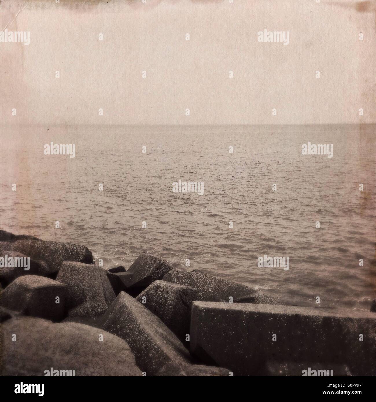 Boulders overlooking winter sea - Smartphone Captured Stock Image