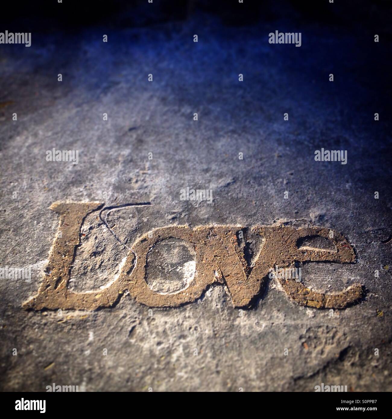 A sign reading 'Love' decorates a street in Colonia Roma, Mexico City, Mexico - Smartphone Captured Stock Image
