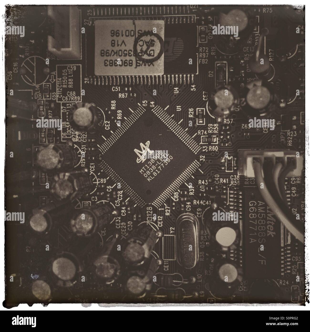 Black and white photo of inside of DVD player. - Smartphone Captured Stock Image