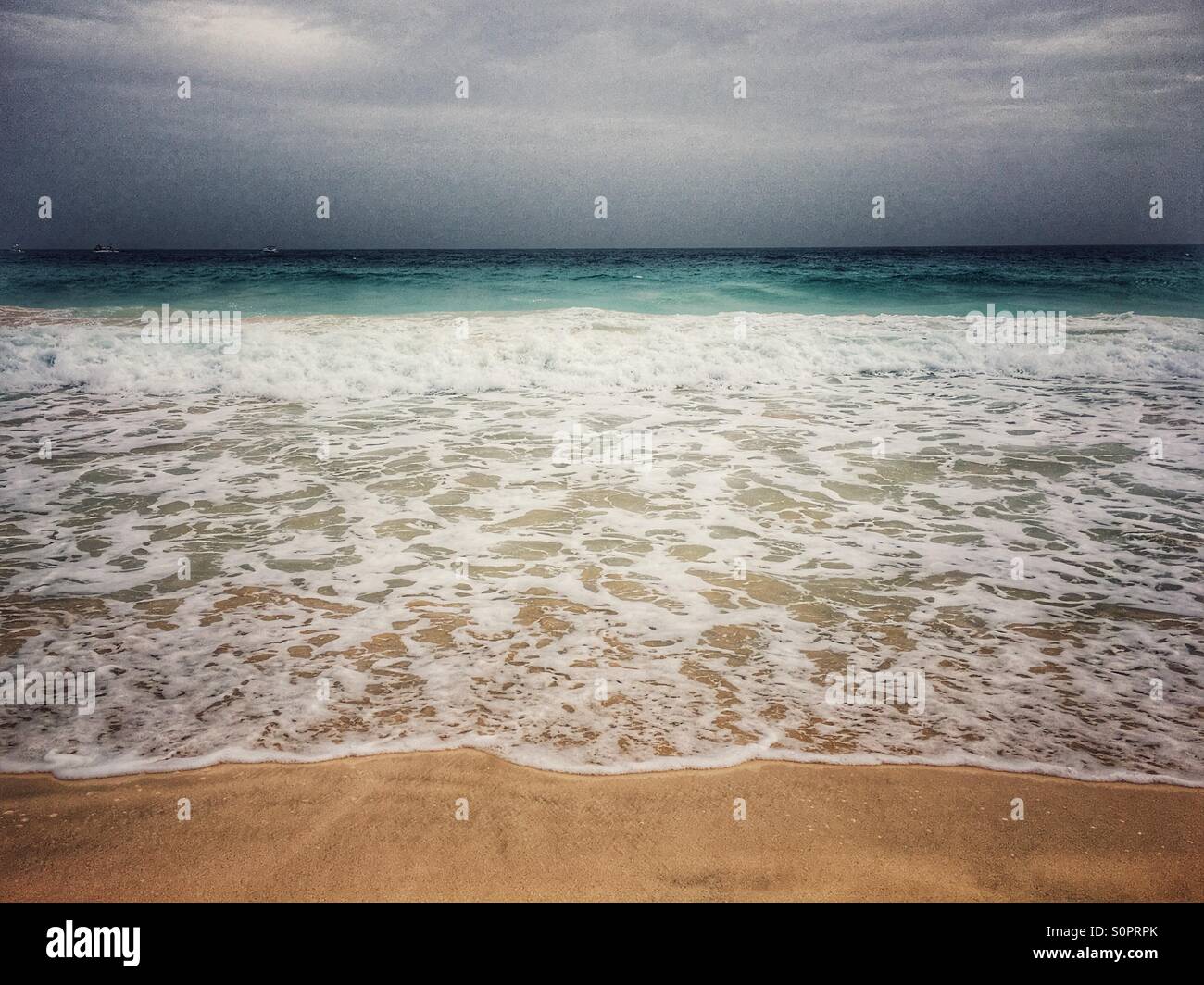 Incoming tide on a stormy day - Smartphone Captured Stock Image