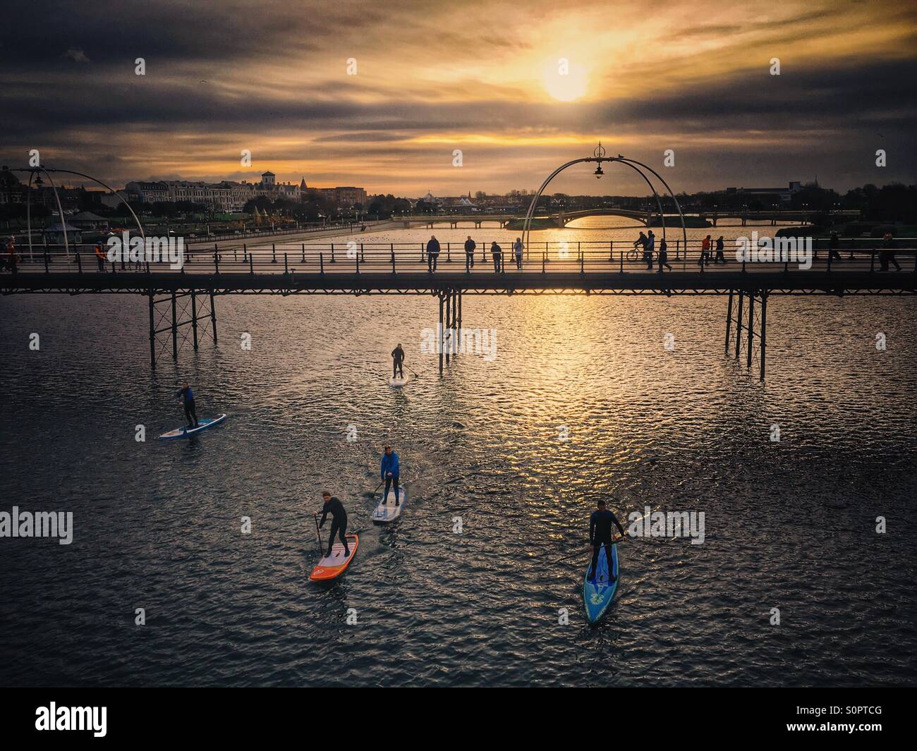 Stand up paddle boarding  on Marine Way lake at Southport - Smartphone Captured Stock Image