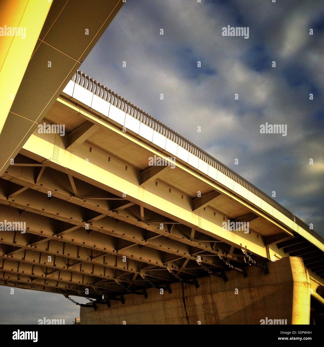 Yellow Flyover under an interesting sky Stock Photo