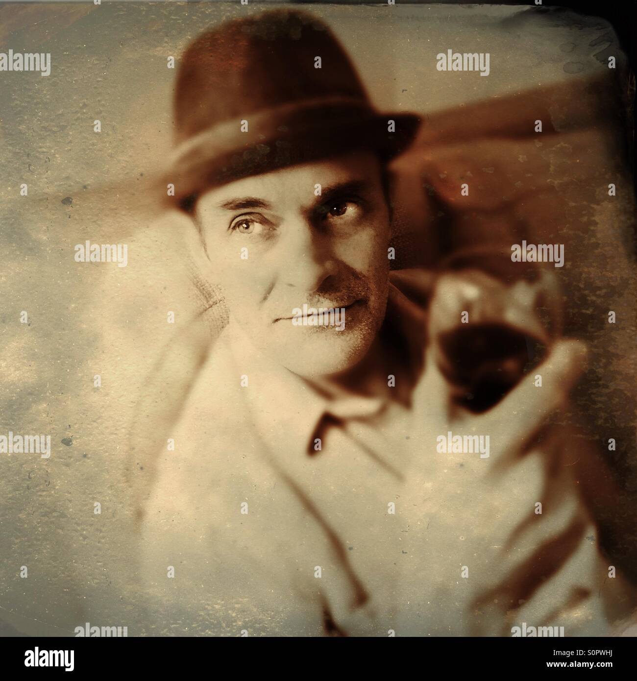 Man drinking glass of red wine - Smartphone Captured Stock Image