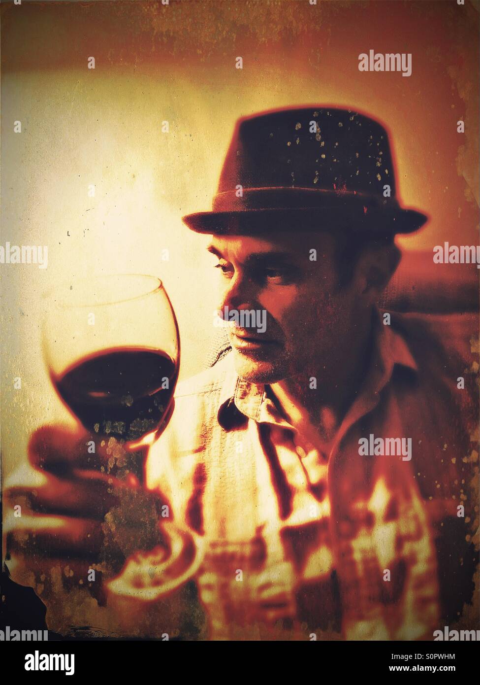 Man holding glass of wine - Smartphone Captured Stock Image