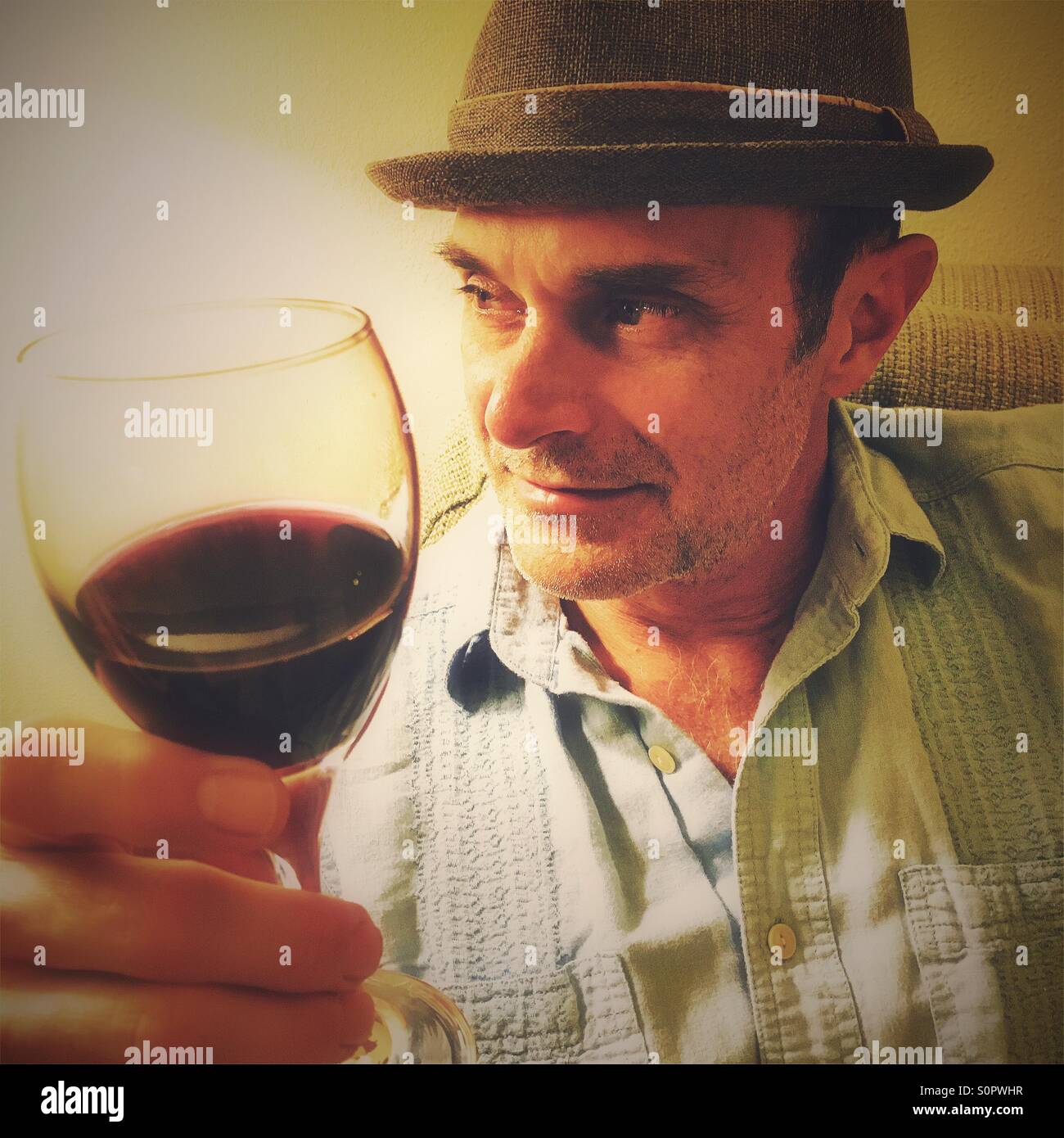 Man enjoying glass of wine - Smartphone Captured Stock Image