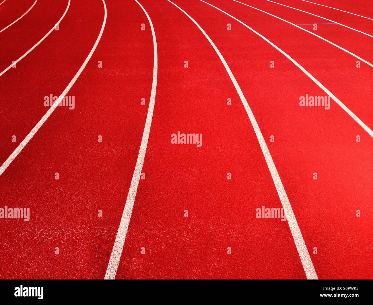 Lines on running track on sports field - Smartphone Captured Stock Image