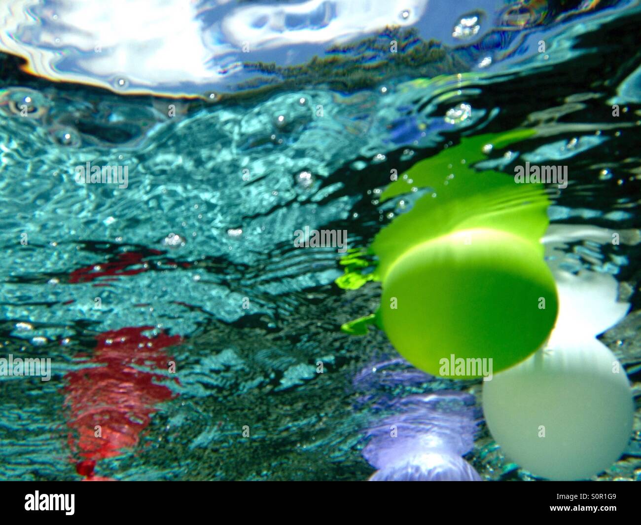 Colorful balloons under water Stock Photo Alamy