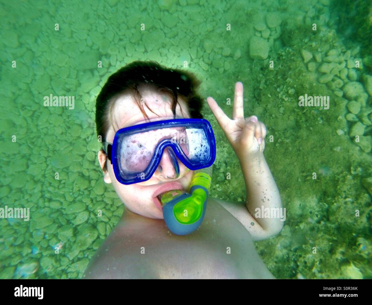 Boy snorkeling Stock Photo