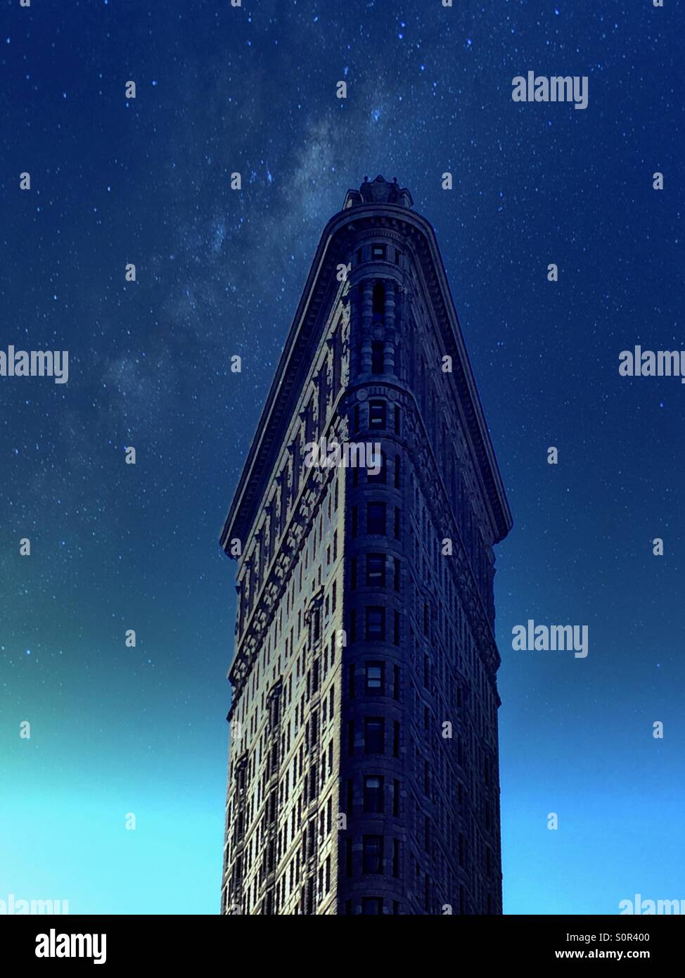 The flat iron building is an iconic landmarks structure in New York City. - Smartphone Captured Stock Image