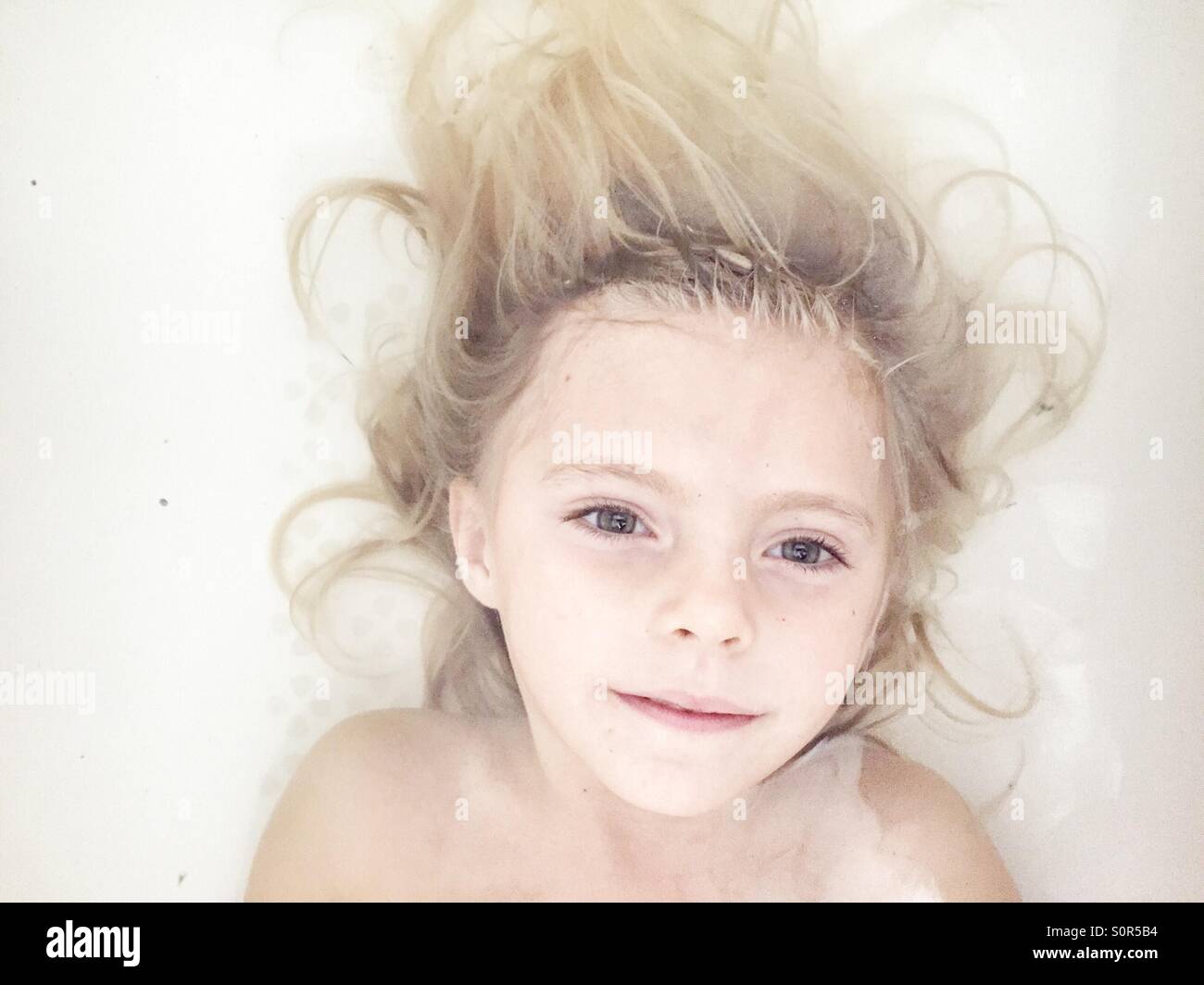 Girl in a bath Stock Photo