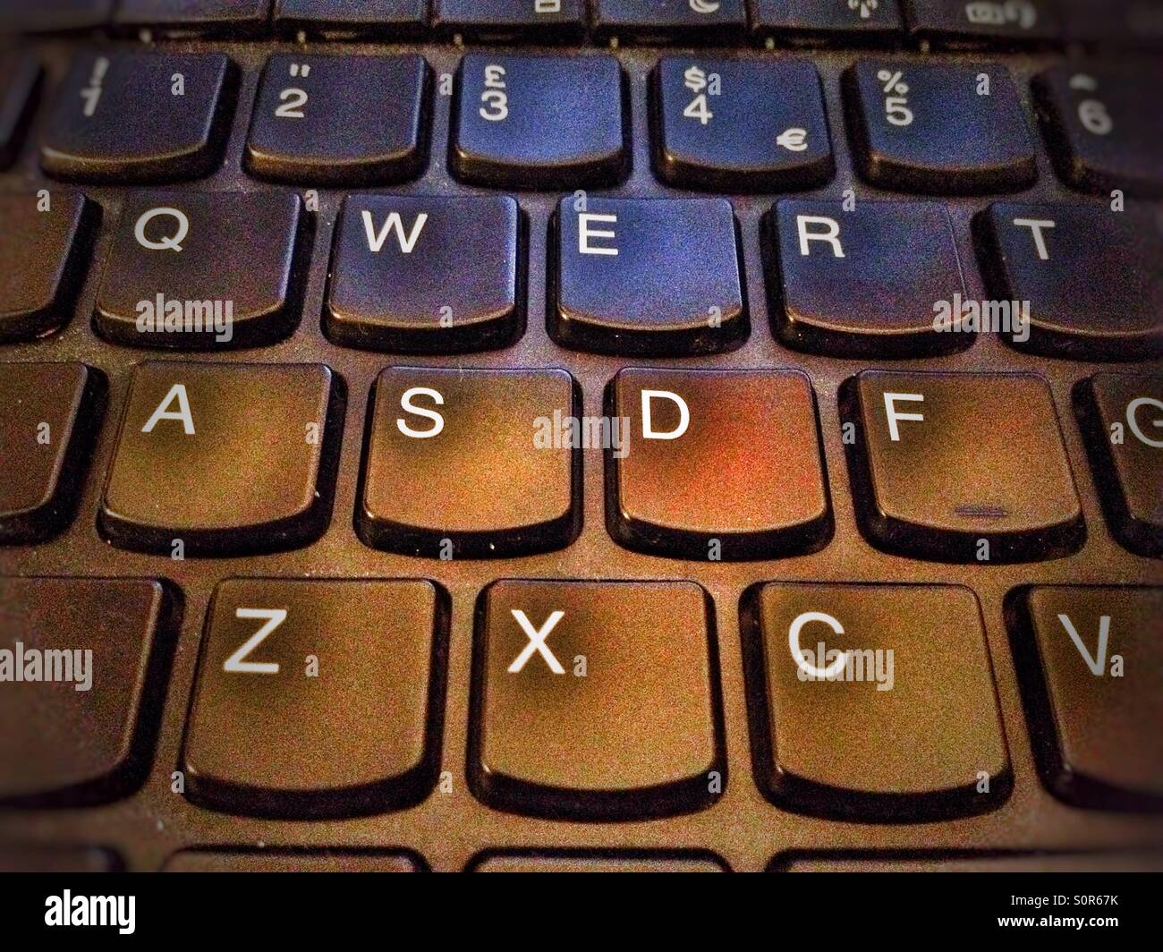 A closeup of buttons on a computer keyboard. - Smartphone Captured Stock Image