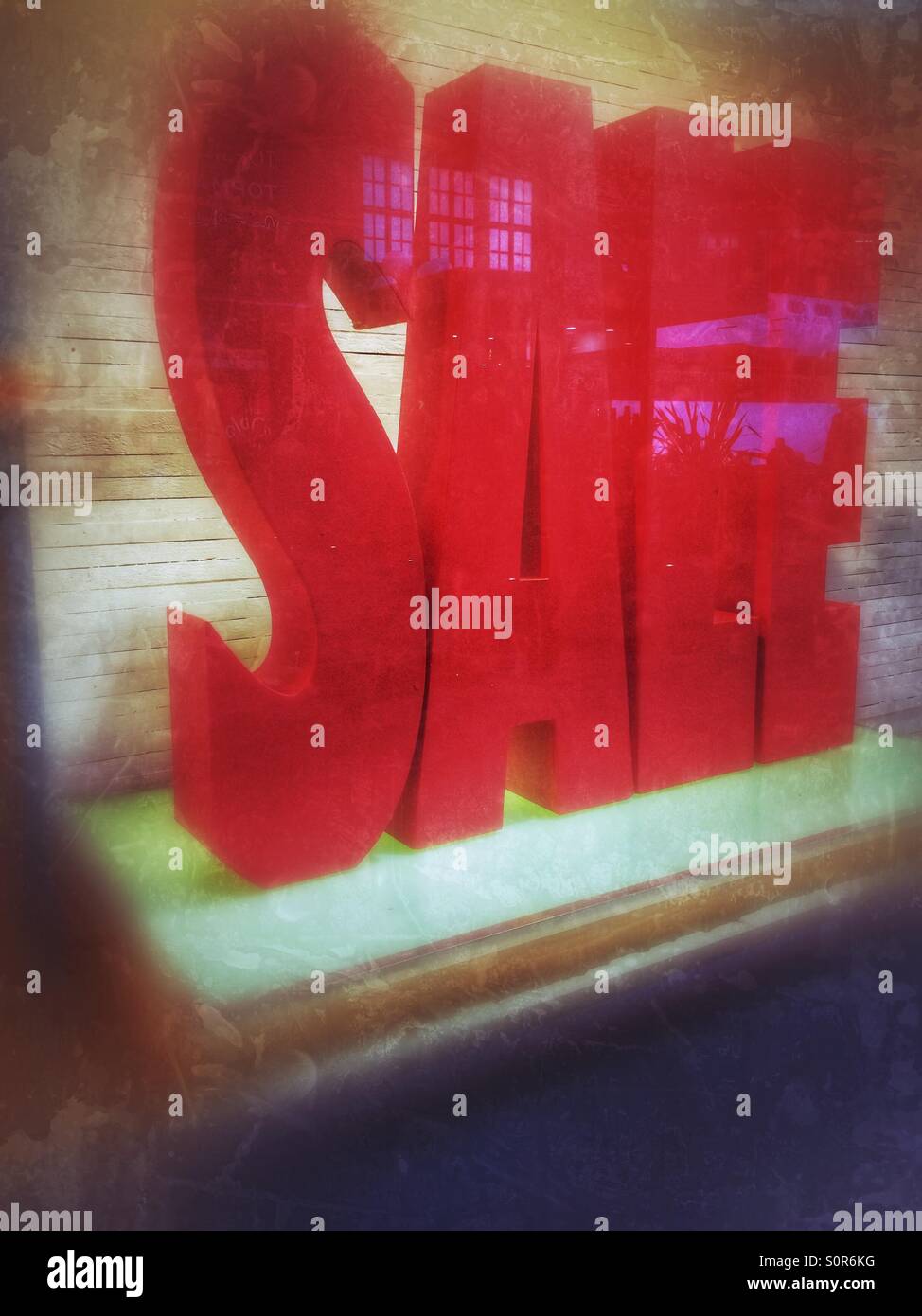 Sale sign in a shop window - Smartphone Captured Stock Image