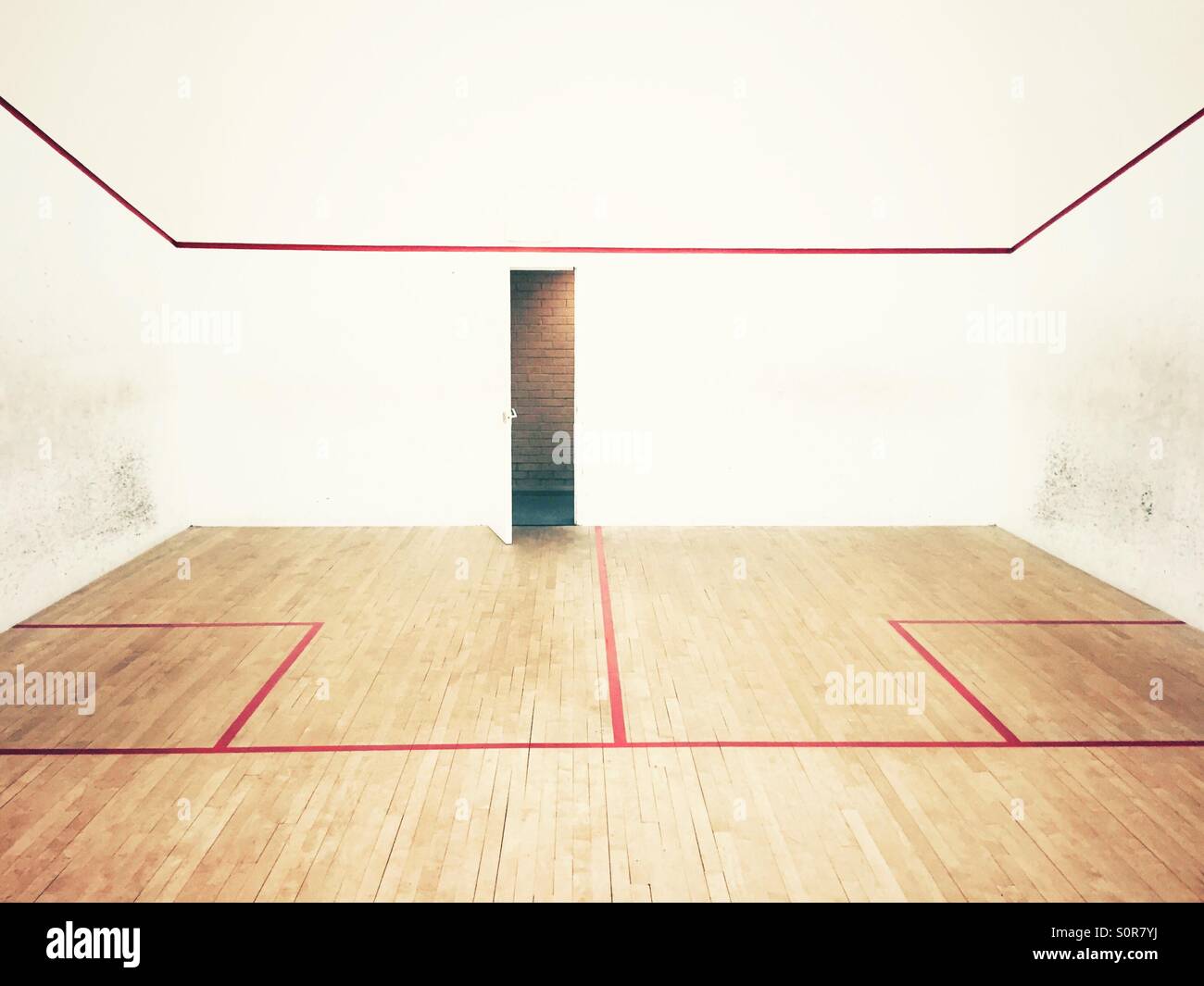 Squash court with the door open Stock Photo Alamy