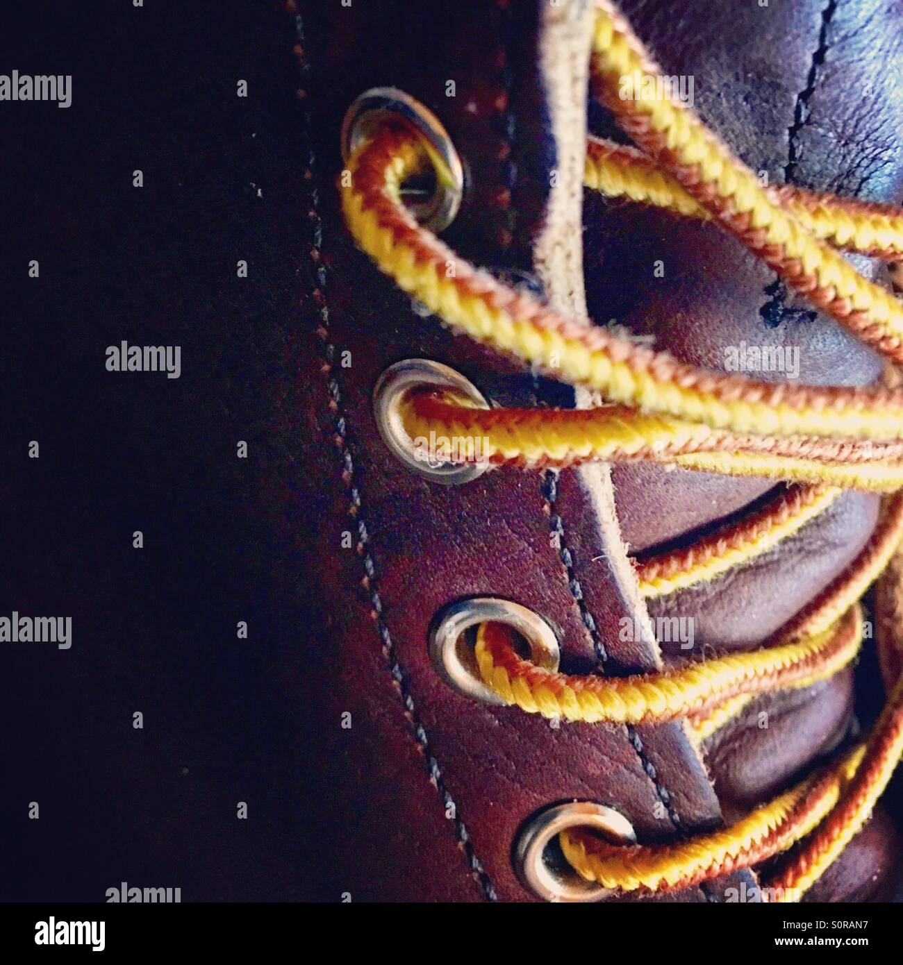 Close-up of laces on a brown leather boot. - Smartphone Captured Stock Image