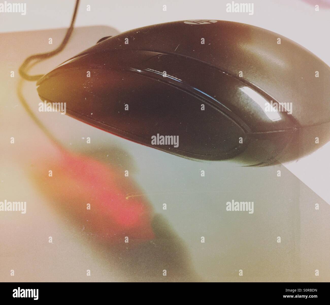 Flying PC mouse - Smartphone Captured Stock Image