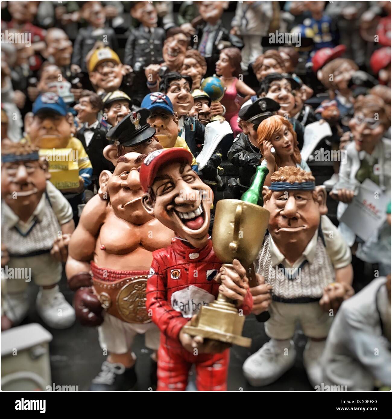 Figurines celebrating a great fellow champion - Smartphone Captured Stock Image