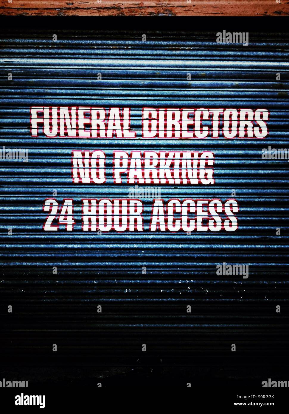 No parking notice on funeral directors door. Stock Photo