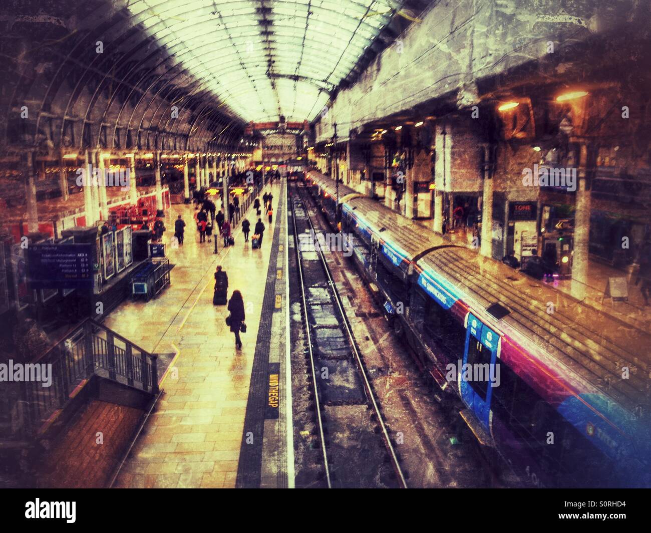 A view of London Paddington Railway Station. A Heathrow express train is waiting to leave. - Smartphone Captured Stock Image