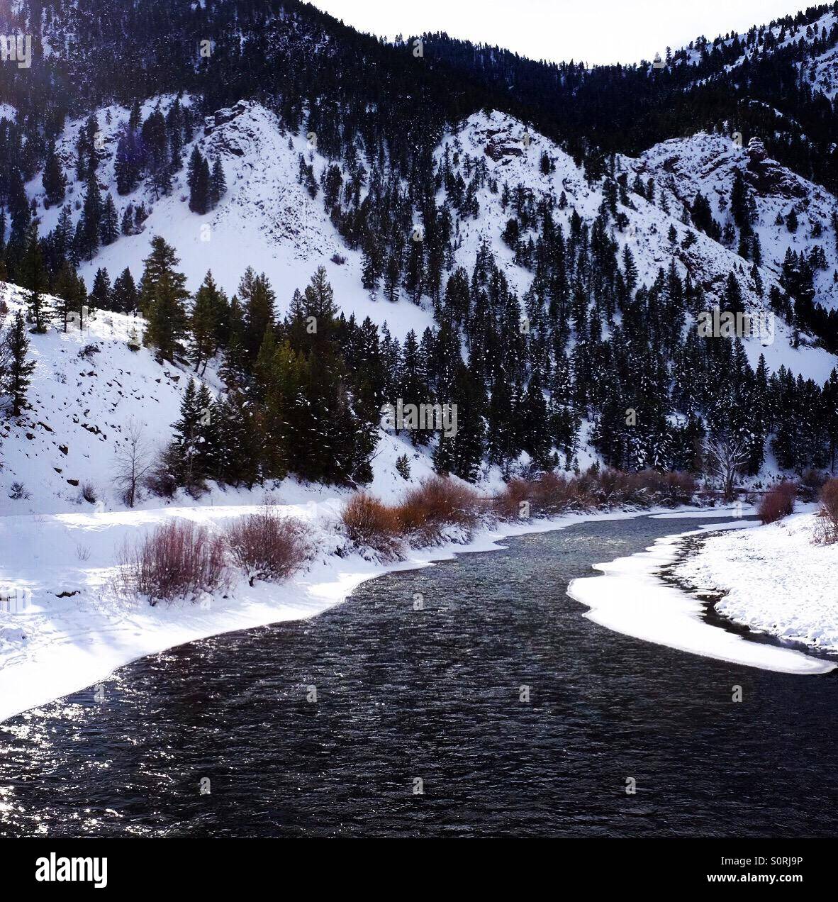 The Salmon River in Idaho with winter snow Stock Photo