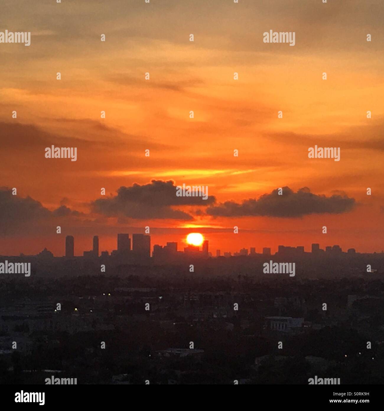Orange sky cityscape sunset Stock Photo
