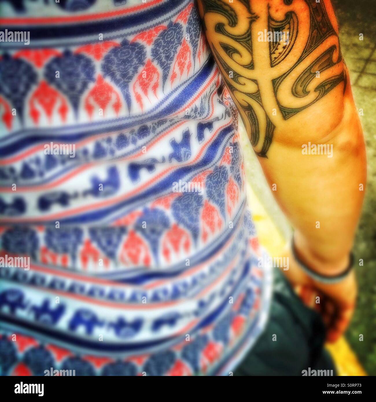Man tattoo arms - Smartphone Captured Stock Image