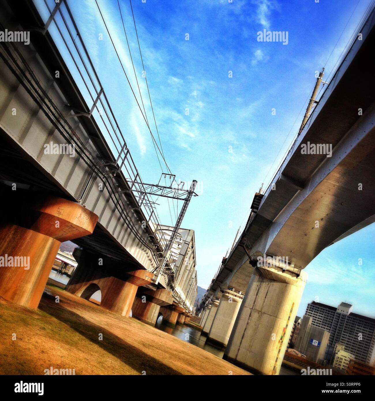 Elevated railway and road Stock Photo