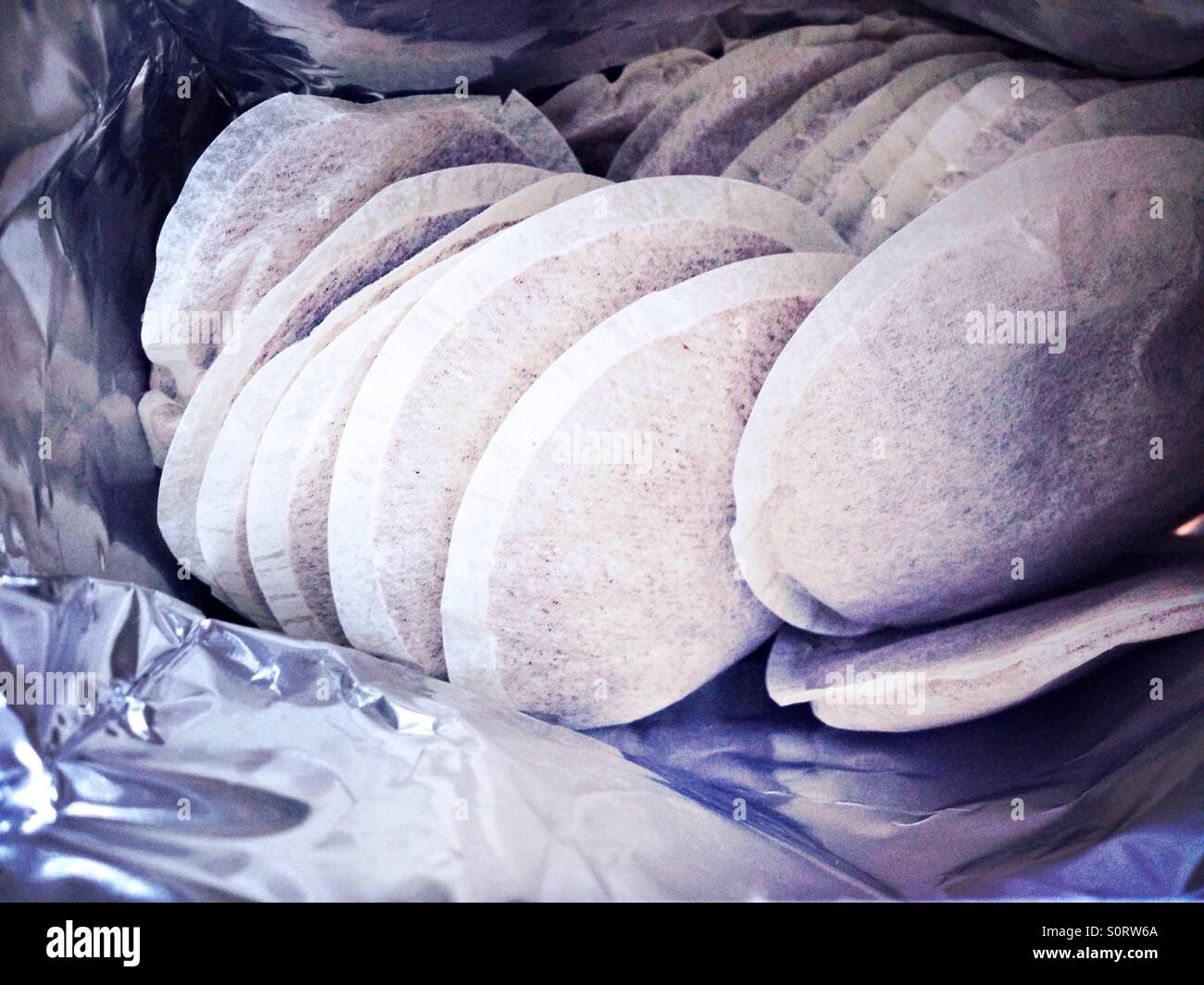 Coffee pads in reflecting packaging - Smartphone Captured Stock Image