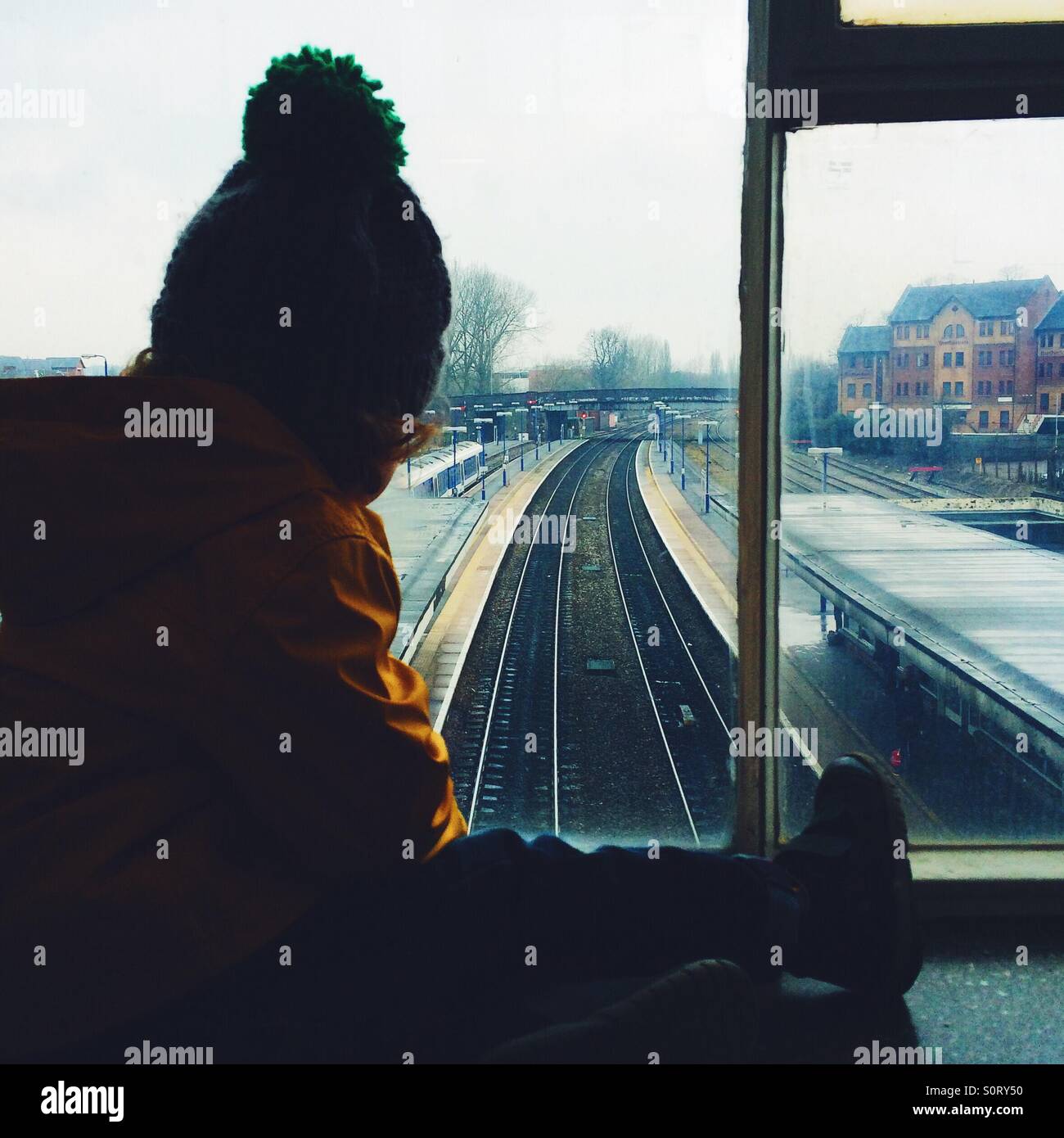 Boy waiting for train - Smartphone Captured Stock Image