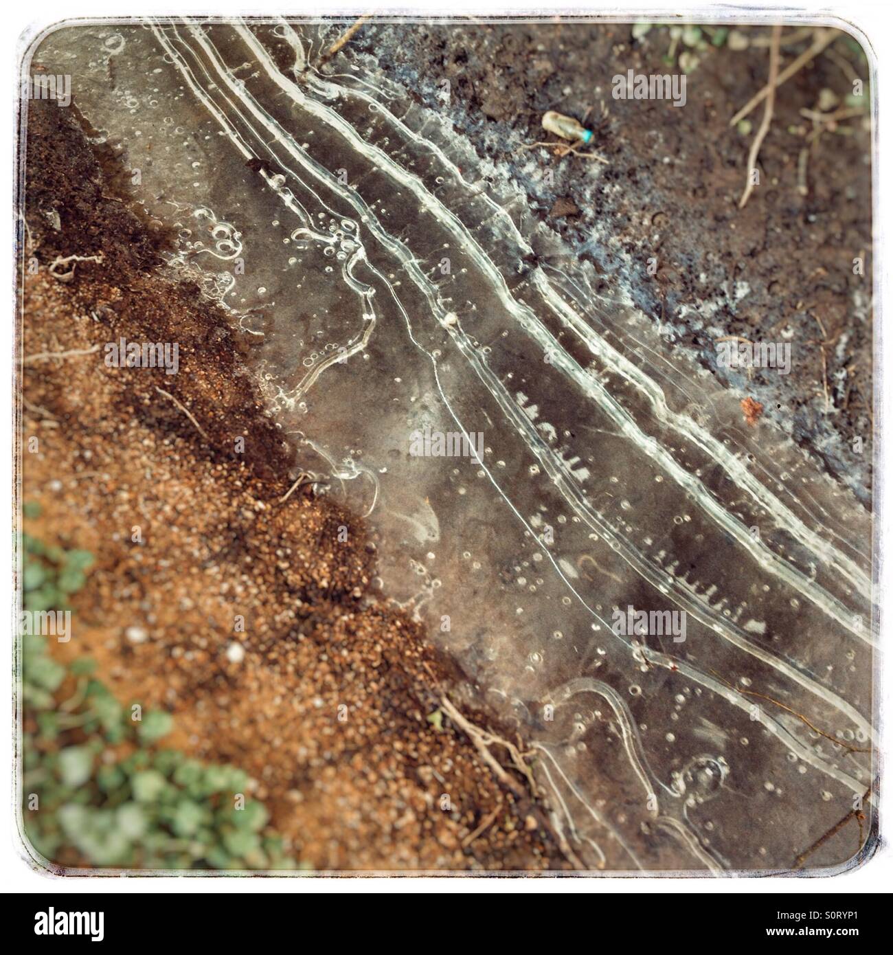 Drainage ditch filled with ice - Smartphone Captured Stock Image