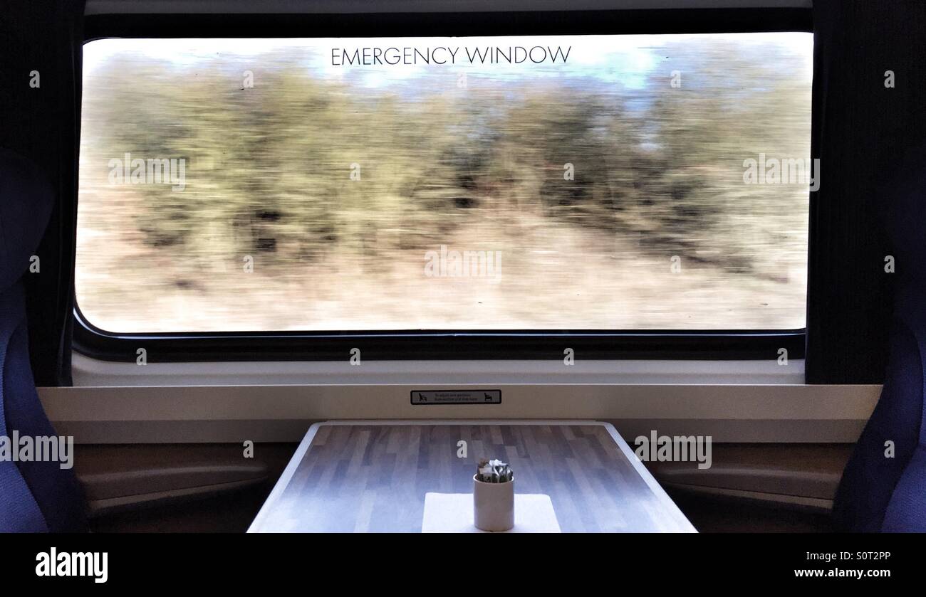 Passing nature scene between York and London through train window. Stock Photo