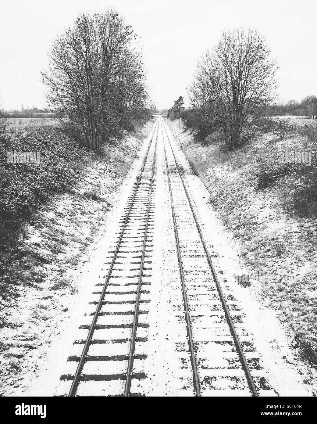 Snow on train track Stock Photo Alamy