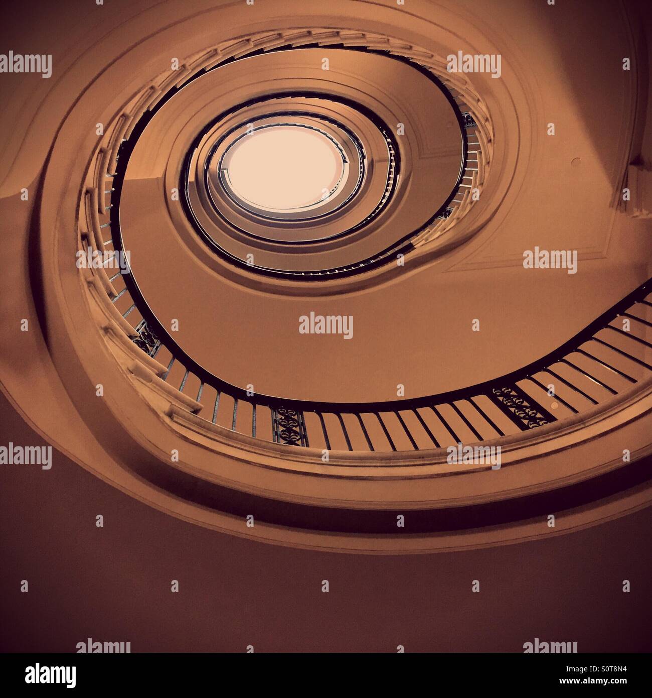 Spiral staircase and skylight. - Smartphone Captured Stock Image