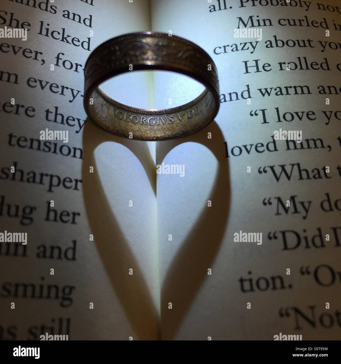 Ring with heart-shaped shadow Stock Photo