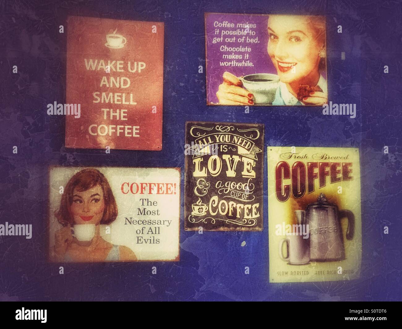 A group of retro effect signs used to advertise COFFEE! All you need is Coffee. Wake Up and Smell The Coffee. Photo Credit - © COLIN HOSKINS. Stock Photo