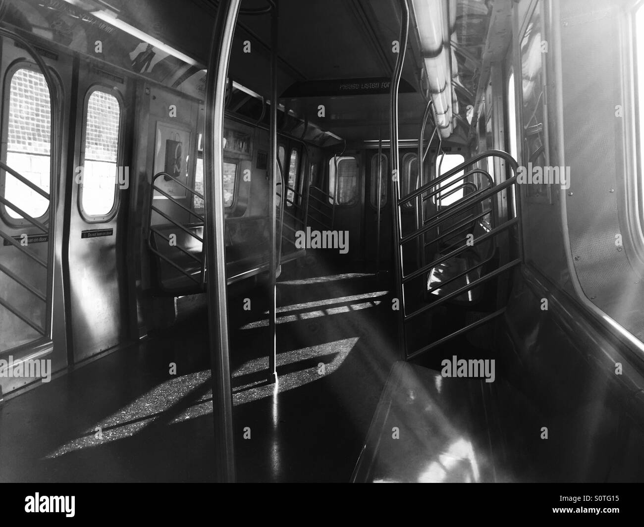 sunlight streaming into empty NYC subway car close to Coney Island Stock Photo