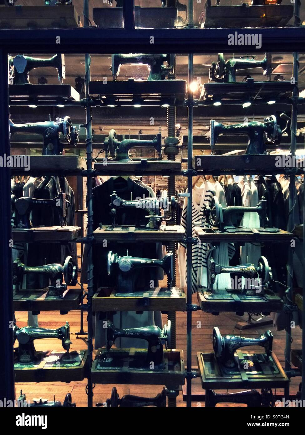 Vintage sewing machine shop display Stock Photo Alamy