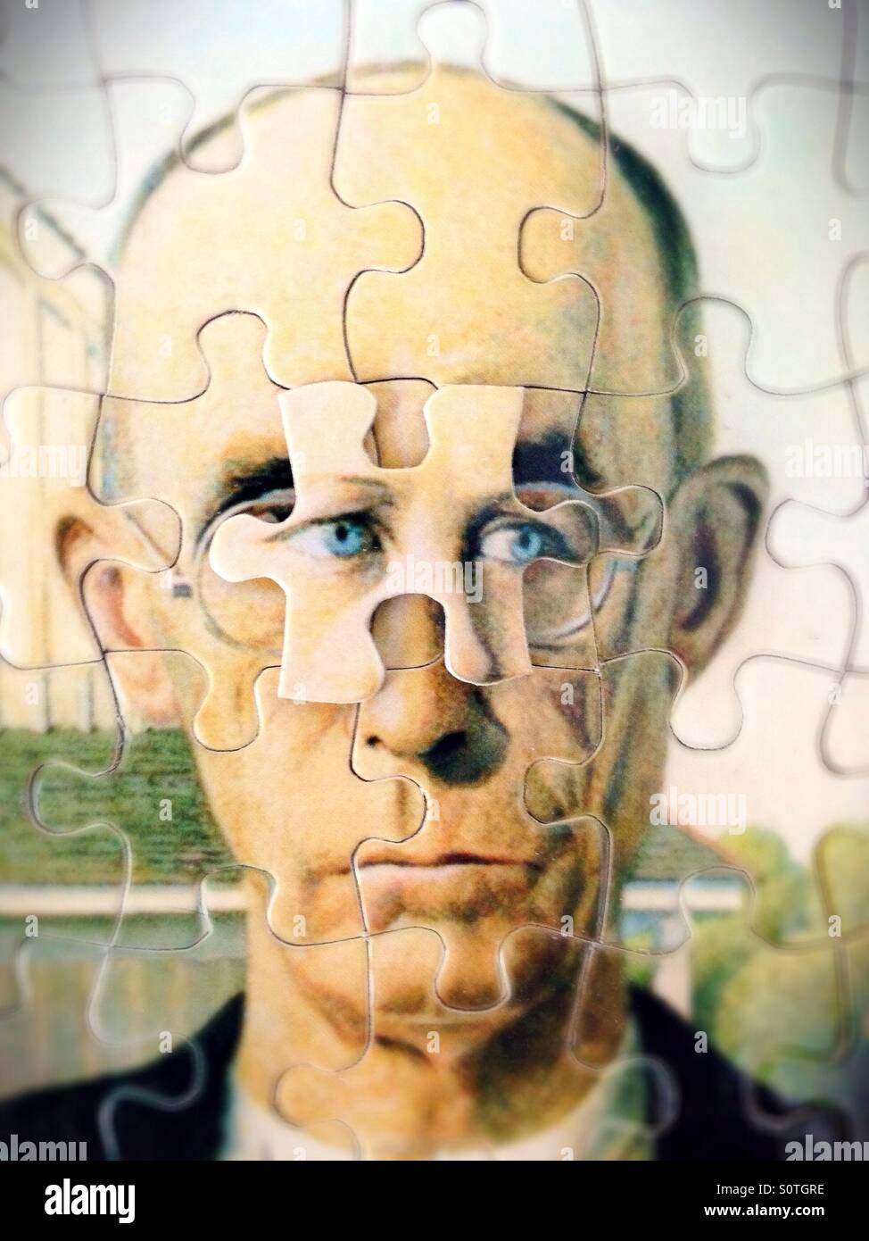 American Gothic puzzle with misplaced puzzle pieces. Stock Photo