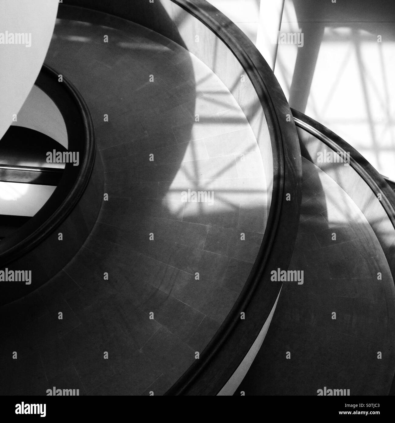 Sun dappled curved walkway at the Vatican museum Stock Photo