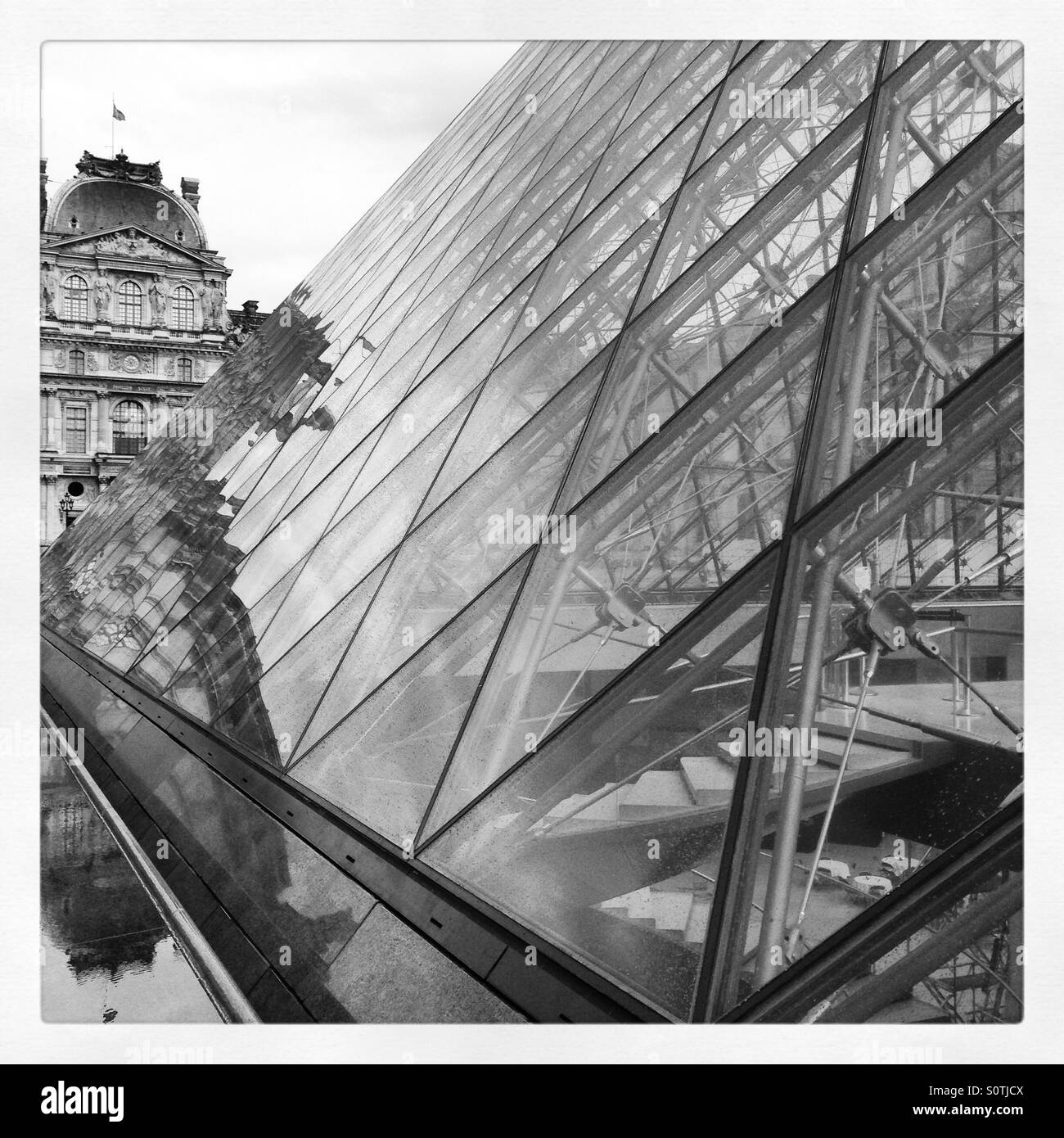The Louvre pyramid, Paris Stock Photo