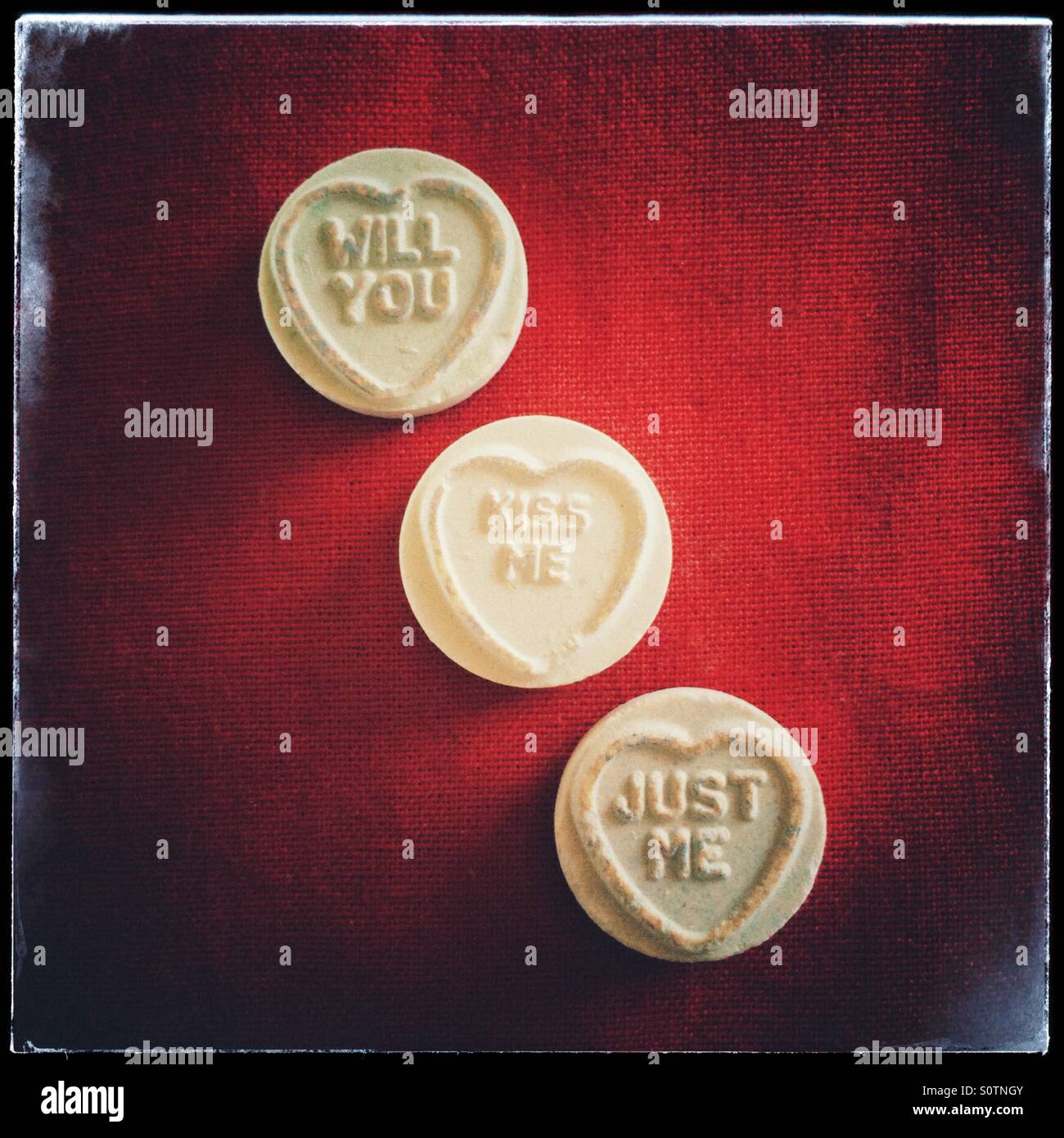 Will you kiss me just me, loveheart sweets. - Smartphone Captured Stock Image