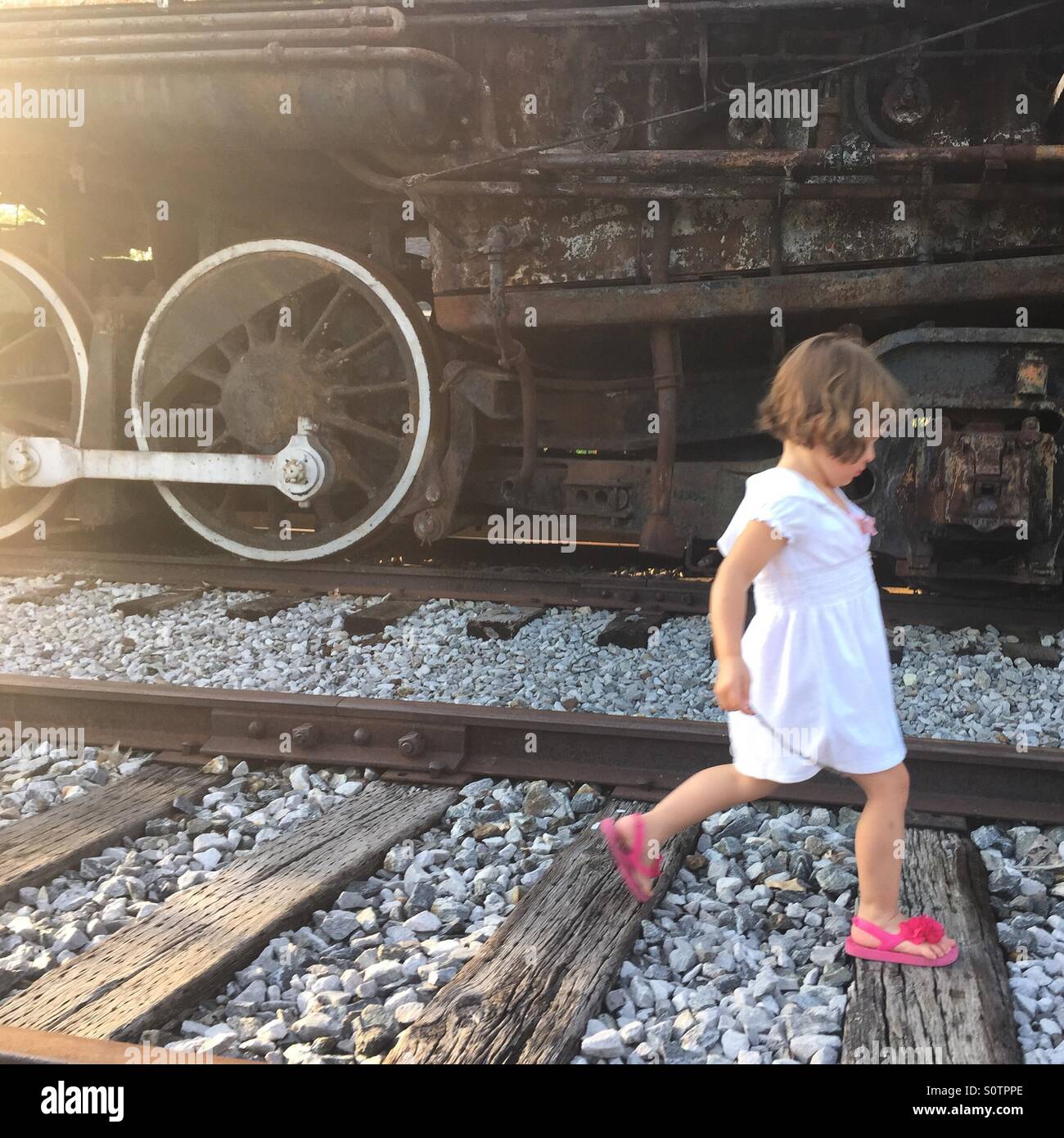 Girl on train tracks hires stock photography and images Alamy